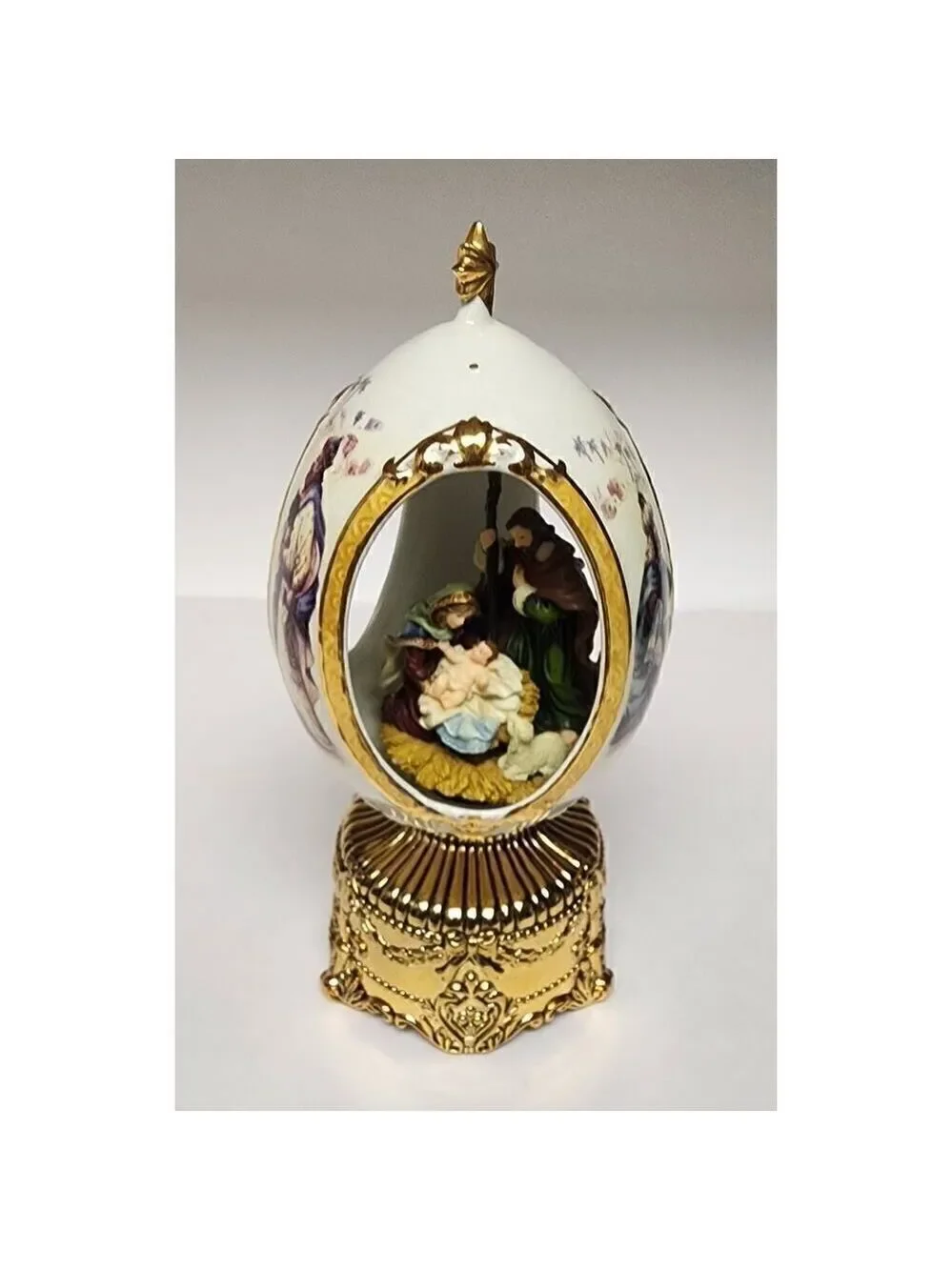 Home For The Holiday Porcelain Egg-Shaped Musical Box Revolving Nativity/Santa